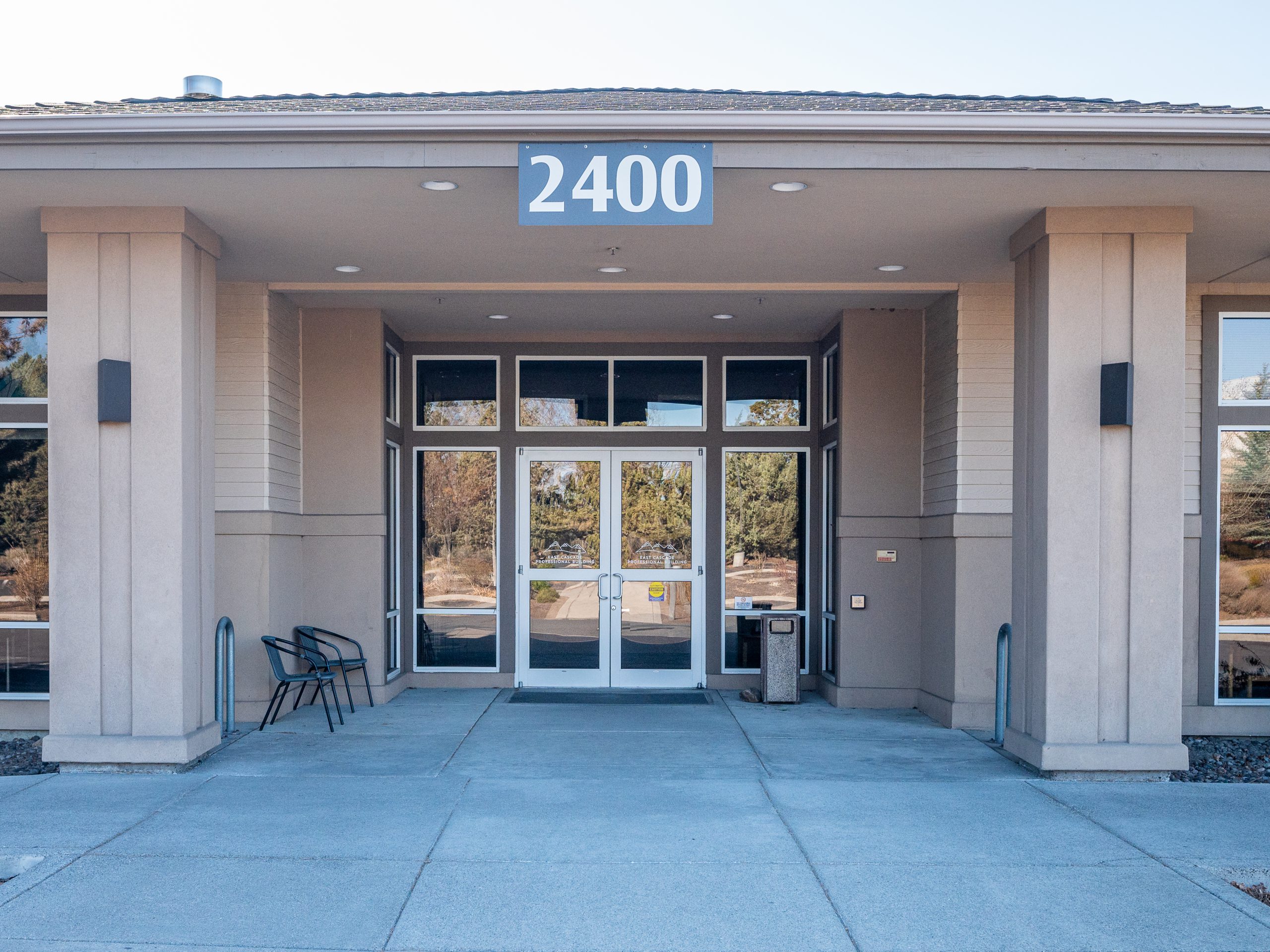 Front doors of clinic with the address of 2400 above the doors