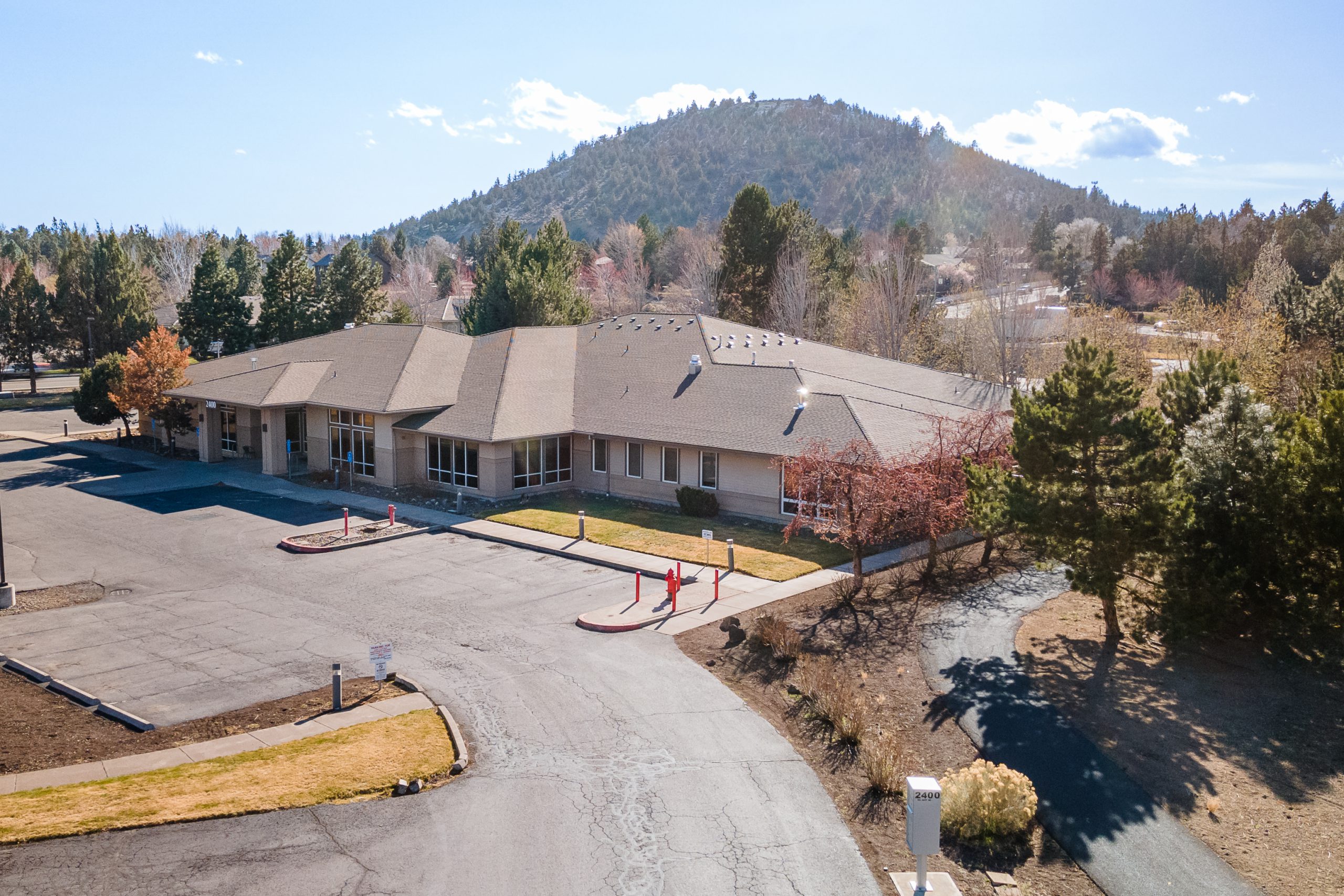 Aerial view of East Cascade Women's Group Clinic including building with pilot butte in background