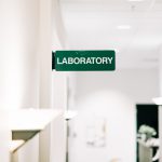 Green laboratory sign located in the hallway of the clinic